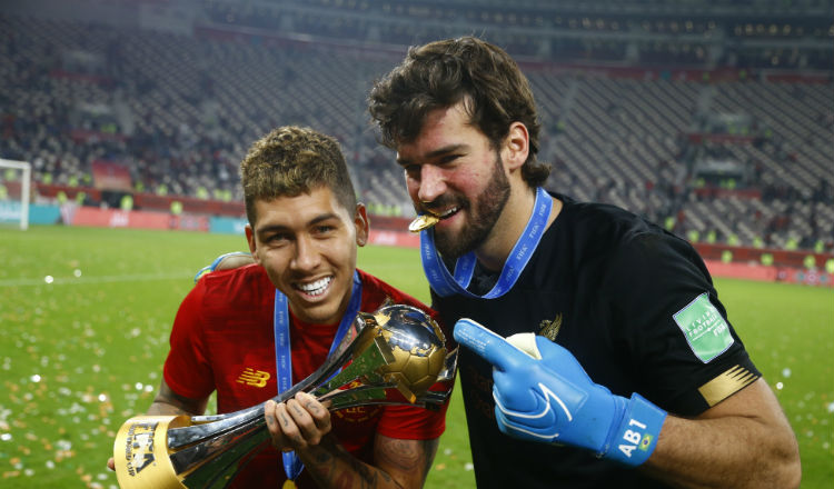 Roberto Firmino junto al portero Alisson Becker. Foto AP Roberto Firmino junto al portero Alisson Becker. Foto AP