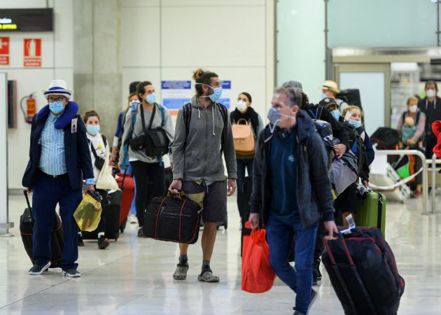 España está lista para recibir con seguridad vuelos en todos sus aeropuertos Se han implantado los controles sanitarios en los aeropuertos. Fotos: EFE/Archivo.