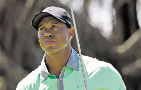 Woods atropella en el Cadillac 