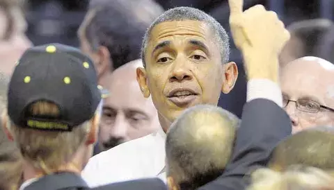  Obama y Arseni Yatseniuk buscan la salida pacífica a la crisis política de Crimea 