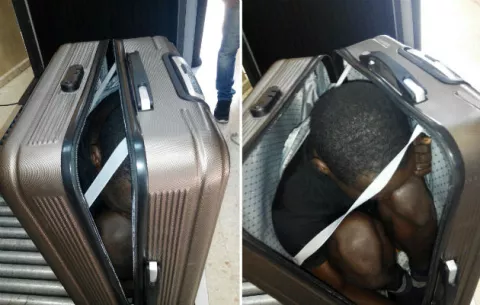 Guardias fronterizos hallan a migrante dentro de una maleta
