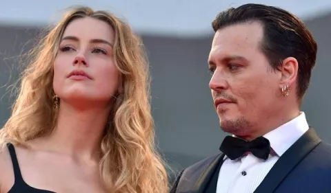 Johnny Depp y Amber Heard tienen un fuego cruzado fuera de los tribunales