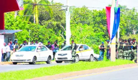 Un fuerte cordón policial impedía el acceso a curiosos  