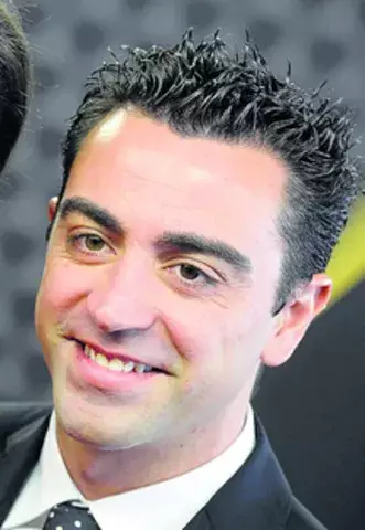 Xavi cumple en Getafe 700 encuentros oficiales con el Barca 