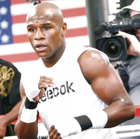 De La Hoya y 50 Cent se pelean por Mayweather Jr. 
