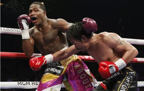 Manny Pacquiao retiene título ante Adrien Broner y reta a Mayweather