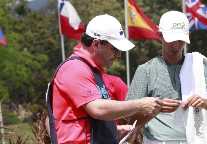 Eduardo Arango fue su 'caddie'.