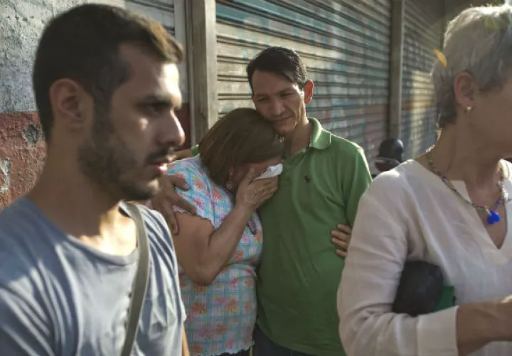 Empleados de la oficina del partido Primero Justicia de Henrique Capriles. FOTO/AP