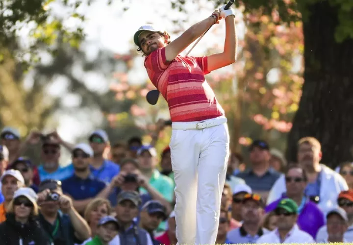 Gana  (izq.) junto a Curtis Luck y Rory McIlroy.