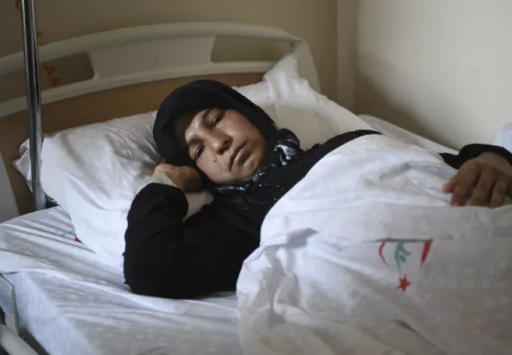 Mujer siria afectada por ataque químico. FOTO/AP