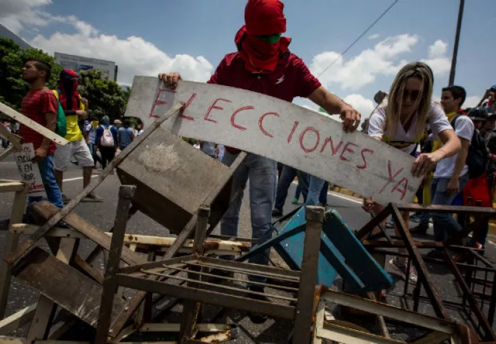 Los venezolanos exigen elecciones lo más pronto posible. FOTO/EFE