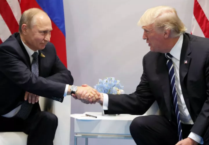 Vladimir Putin se reunión con Donald Trump. FOTO/EFE