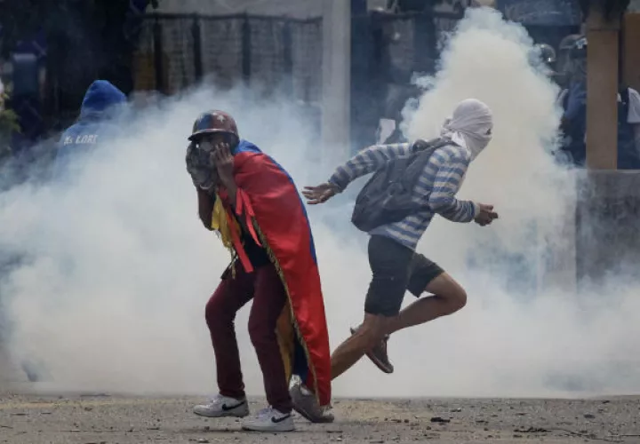 Manifestantes se toman las calles de Venezuela. FOTO/EFE