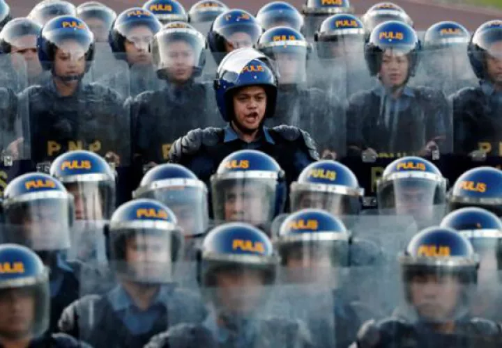 Policías antidisturbios. Foto: EFE 