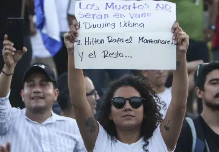 La ciudadanía asegura que no olvidarán a los muertos por la represión. FOTO/EFE