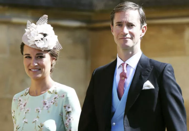 Pippa y su esposo. AP