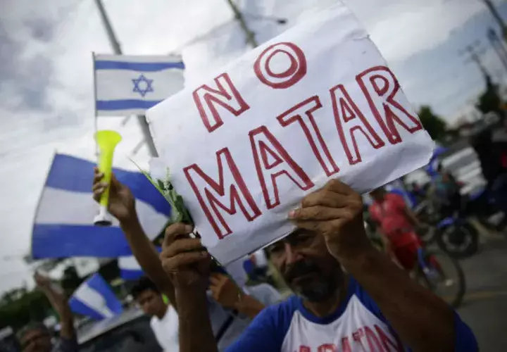 La población exige que termine de una vez por todas con la violencia y la masacre. FOTO/EFE