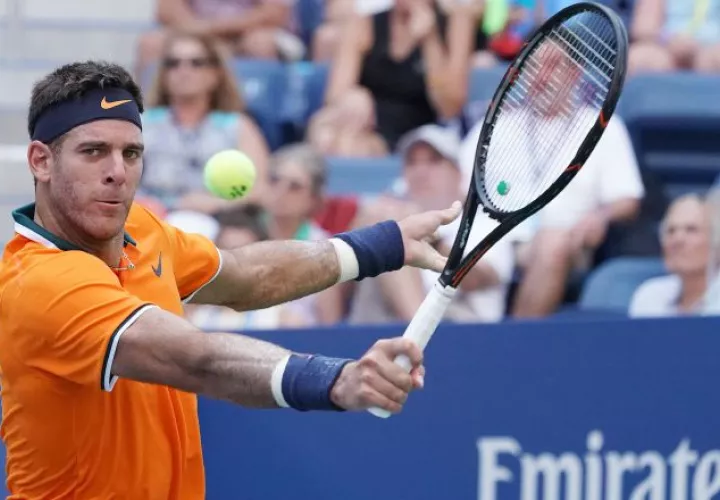 Juan Martin Del Potro devuelve una bola a Denis Kudla. /Foto EFE
