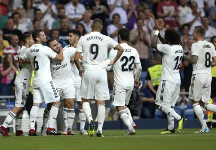 Los jugadores del Real Madrid celebran su ventaja sobre Getafe. Foto AP