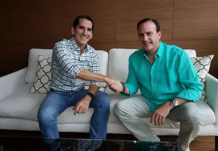 Riccardo Francolini junto a Rómulo Roux.