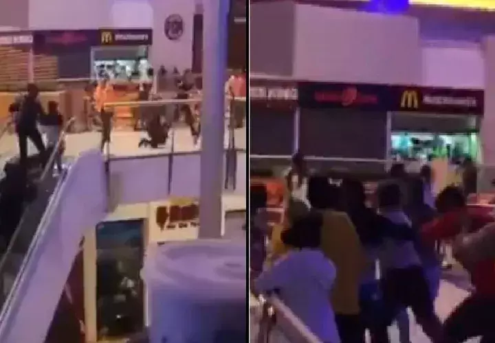 Gran cantidad de jóvenes corriendo por los pasillos cercanos a la sala de cine en Multiplaza