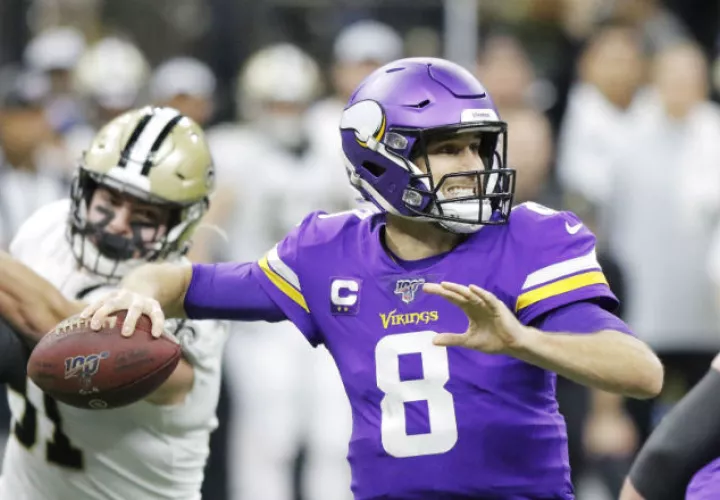 Kirk Cousins concretó el pase ganador. Foto EFE