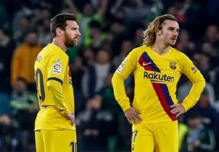 Messi y Antoine Griezmann. Foto:AP