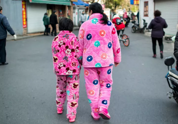 Software en China detectó a una mujer que salió en piyama, y fue citada por “conducta no civilizada”. Foto / Johannes Eisele/Agence France-Presse, vÍa Getty Images.
