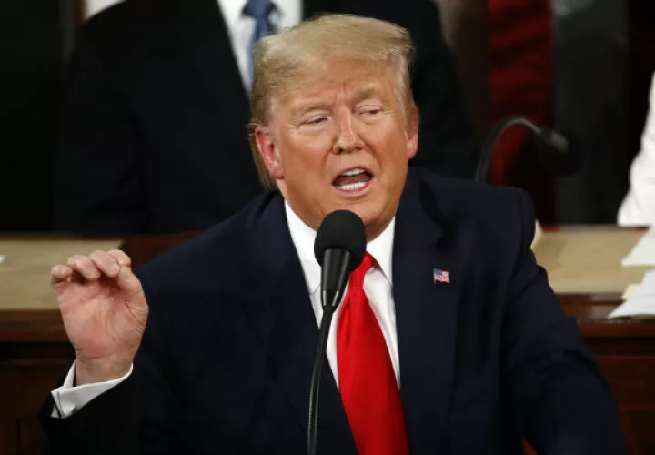 El opositor venezolano Juan Guaidó, de pie tras ser reconocido por el presidente  Trump. Foto: EFE.