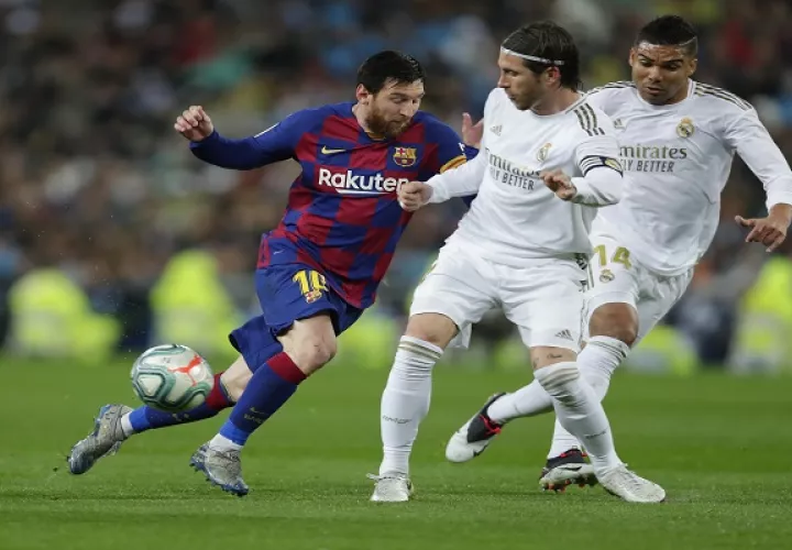 Messi (izq.) y Sergio Ramos. Foto:EFE