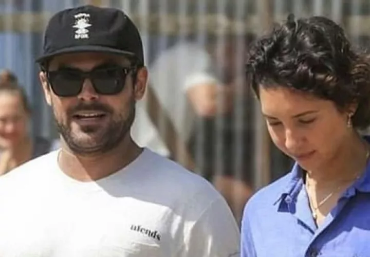 Zac Efron y Vanessa Valladares paseando en Byron Bay. Foto: Instagram