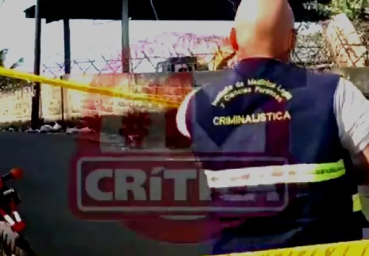 El cuerpo de la víctima estaba próximo a un basurero a orillas de una calle en sector. Foto: Cortesía