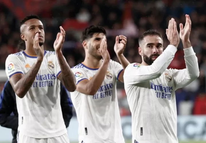 Éder Militao, Marco Asensio y Dani Carvajal del Real Madrid Foto.EFE