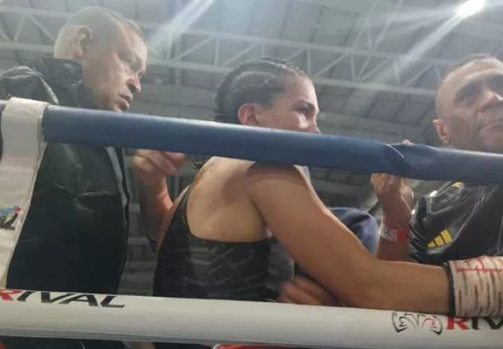 Nataly Delgado y su entrenador Julio Archibold (der,). Foto: Jaime Chávez
