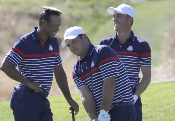 Woods, Reed y Thomas durante  las prácticas. /Foto AP