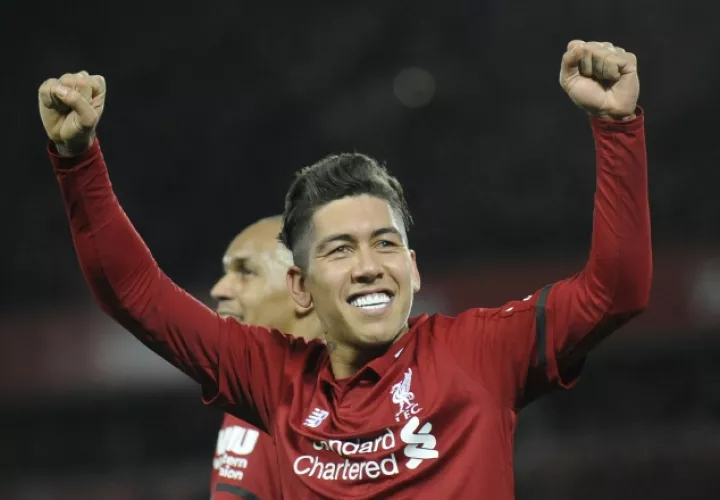 Firmino anotó al minuto 14, amplió al 16 y cerró su cuenta  al 65 de penal. /Foto AP