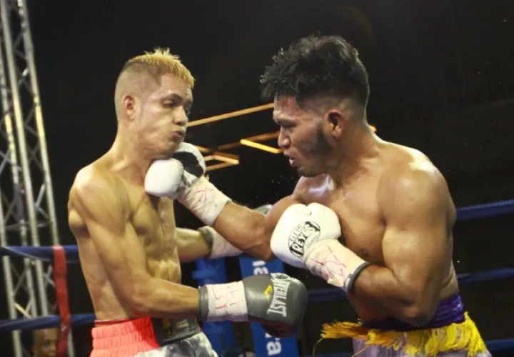 Francisco Pachay perdió el invicto ante Félix Montenegro (derecha). Foto Anayansi Gamez