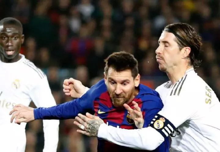 Messi del Barcelona y Sergio Ramos de Real Madrid. Foto:AP