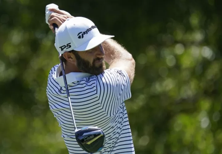 Dustin Johnson en su ensayos en la cancha. Foto:AP