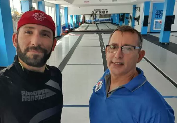 Arturo Dorati (izq.) y su entrenador Jorge Valdés. Cortesía