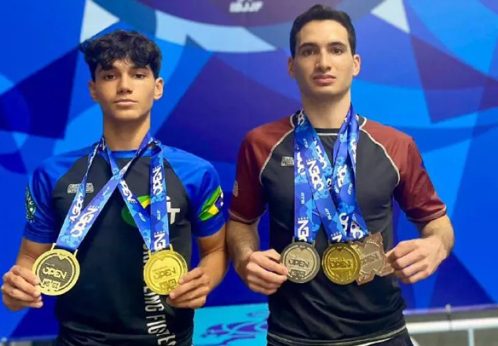 Los hermanos Calviño muestran sus medallas. Foto: Cortesía