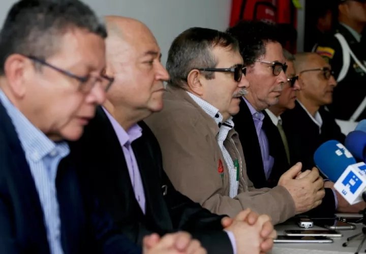 Ex miembros de las FARC participan de una audiencia en la Justicia Especial para la Paz. FOTO/AP