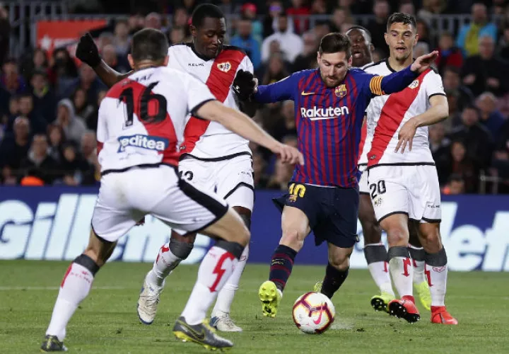 Lionel Messi en el acción en el partido contra Rayo Vallecano. Foto:AP