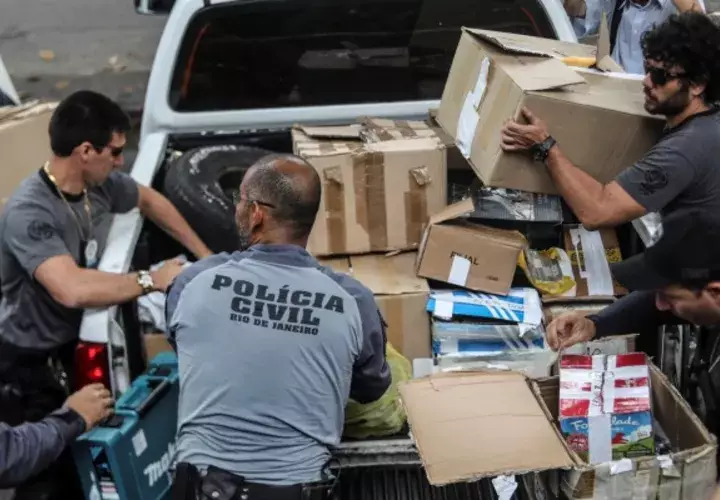 La policía identificó a los sospechosos como Ronnie Lessa y Elcio Vieira de Queiroz. Las autoridades presumen que Lessa le disparó a Franco mientras que De Queiroz supuestamente conducía el auto utilizado para cometer el crimen. FOTO/EFE
