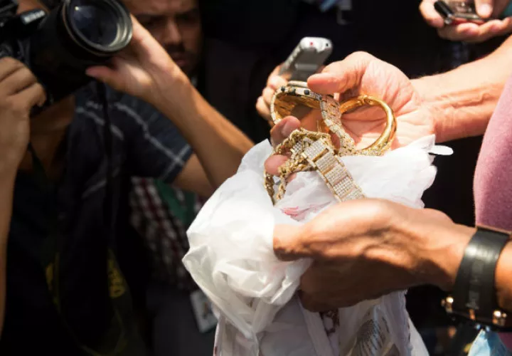 Joyas que portaba  'Big Papi' al momento de ser atacado con un disparo. Foto:EFE