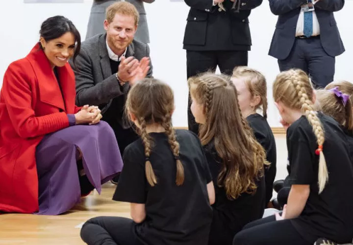 Harry y a su esposa, Meghan Markle. 