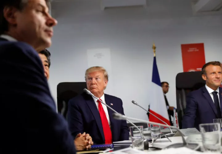 El Presidente Trump cambió rápidamente su postura sobre la guerra comercial de EU con China en el G7. (Carlos Barria/Agence France-Presse — Getty Images)