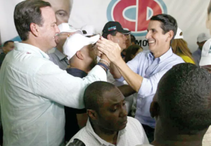 Riccardo Francolini junto a Rómulo Roux. 