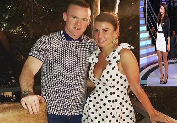 Rooney y su esposa.