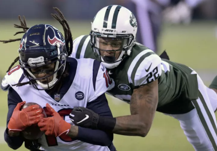 DeAndre Hopkins (izq.)